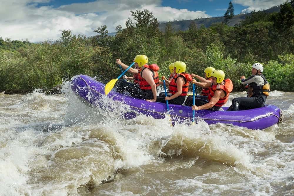 A raft full of people who used our Gatlinburg white water rafting coupons.