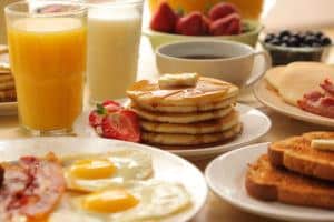 A variety of breakfast dishes on a table.