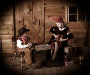 boy and a girl posing in costumes