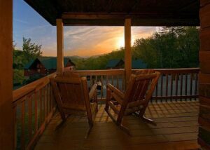 front porch on a cabin at sunset