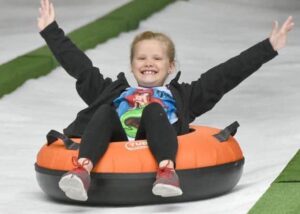 girl tubing at Pigeon Forge snow