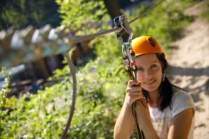 Woman preparing to go ziplining