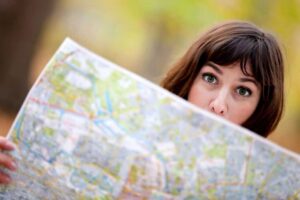 Woman looking over map of area