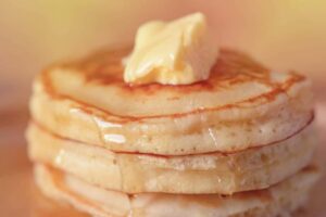 stack of pancakes with butter on top | Best Breakfast Spots in The Smokies