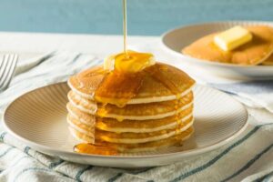 stack of pancakes with syrup