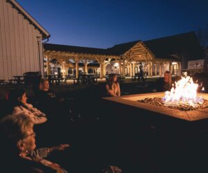 SkyLand Ranch view at night with the bonfire